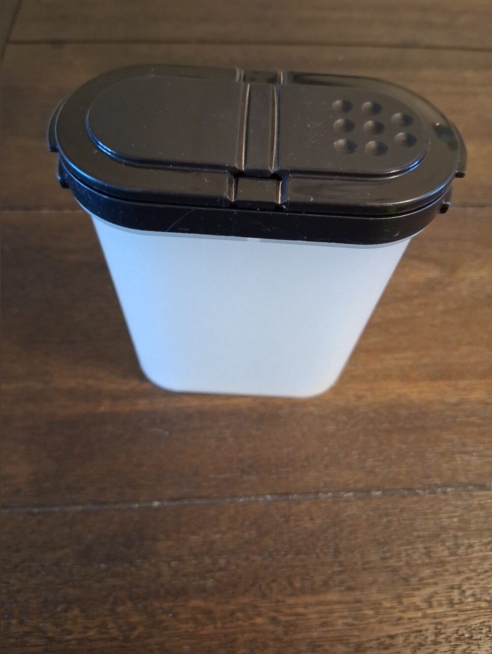 Blaxk And White Tupperware Spuce Container